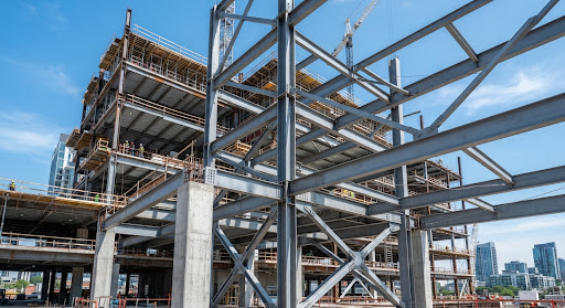 Structural steel frame erected on an active construction site
