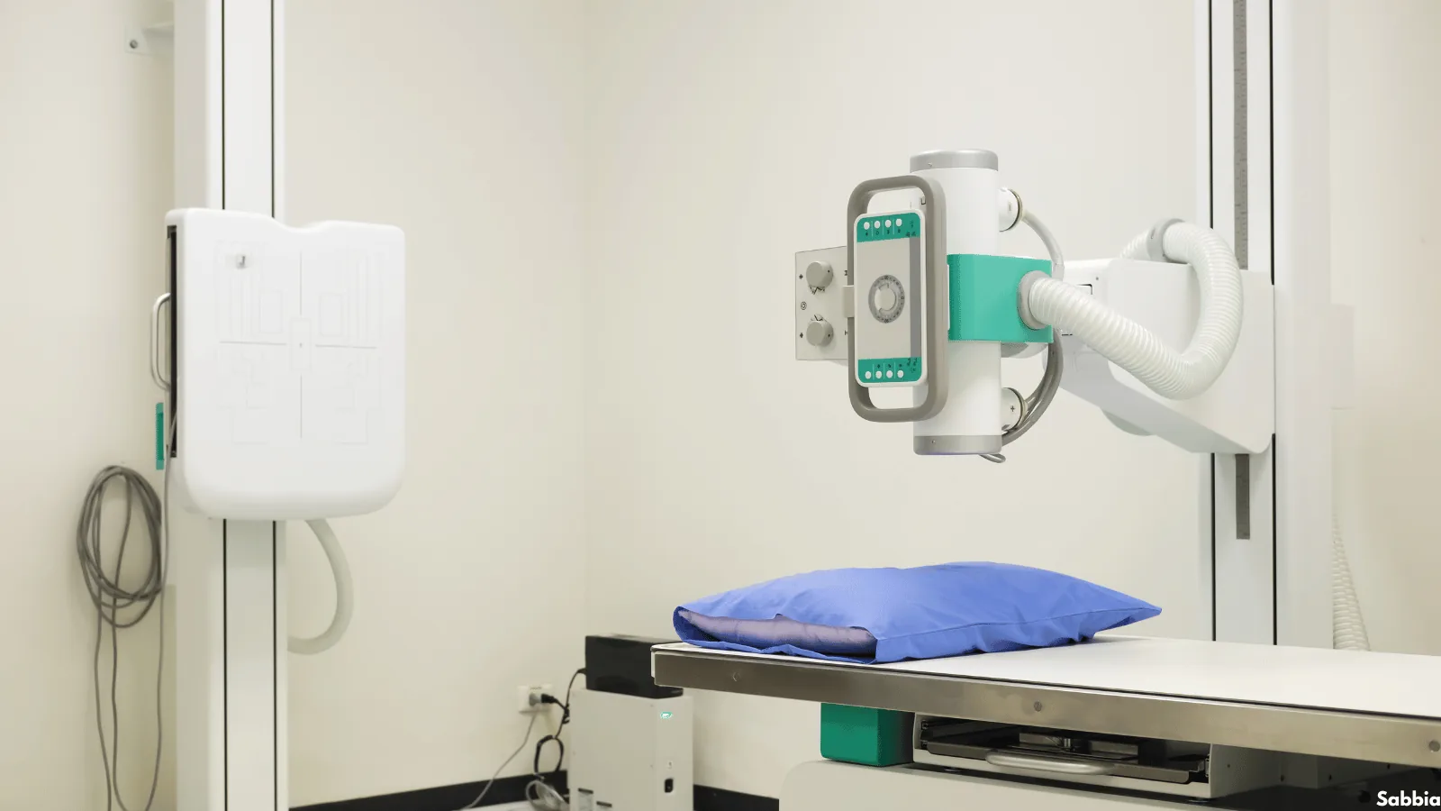 Radiography room with a wall-mounted X-ray system installed and commissioned